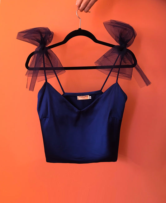 Muestra top de moños azul marino talla 4-6